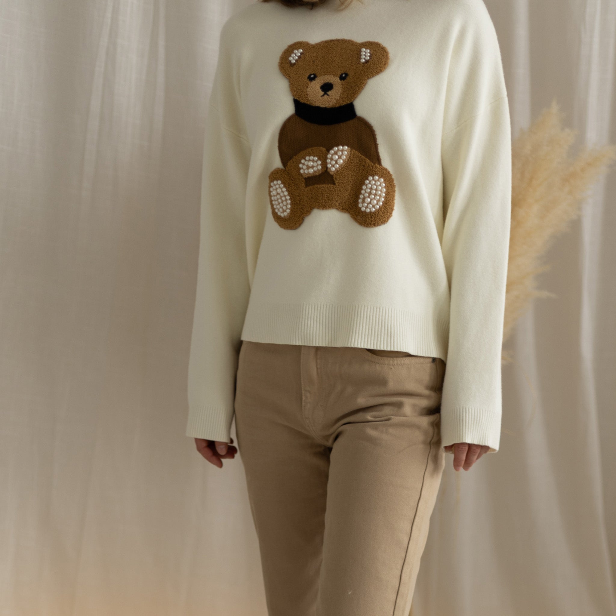 Pulover z motivom medvedka
